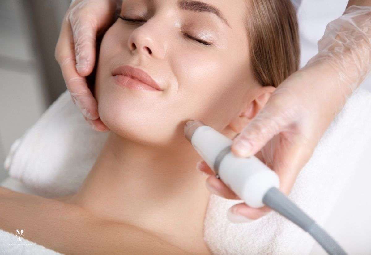 Dermatologist performing advanced laser treatment for skin rejuvenation